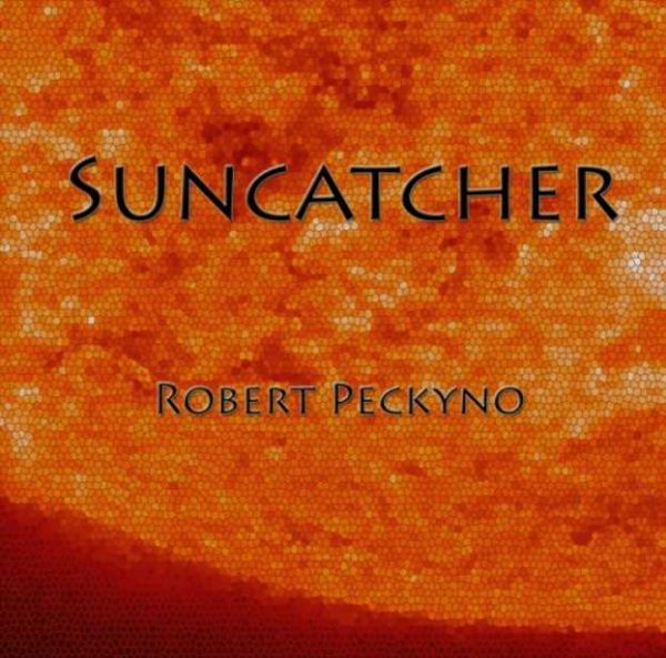 Suncatcher Cover (close up image of the sun with a mosaic stained glass effect)